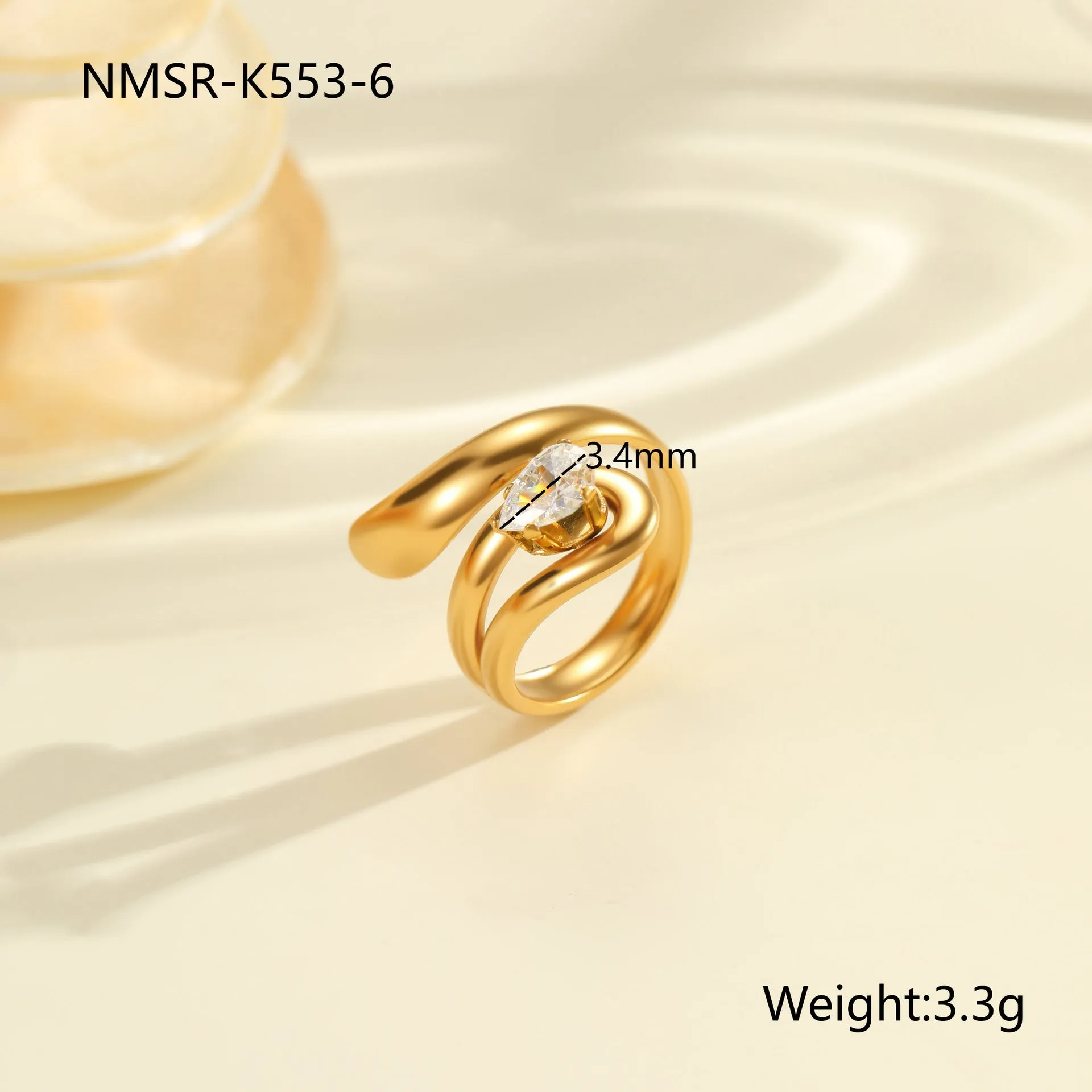 Geometric open mouth zircon ring in stainless steel with electroplated colour finish.