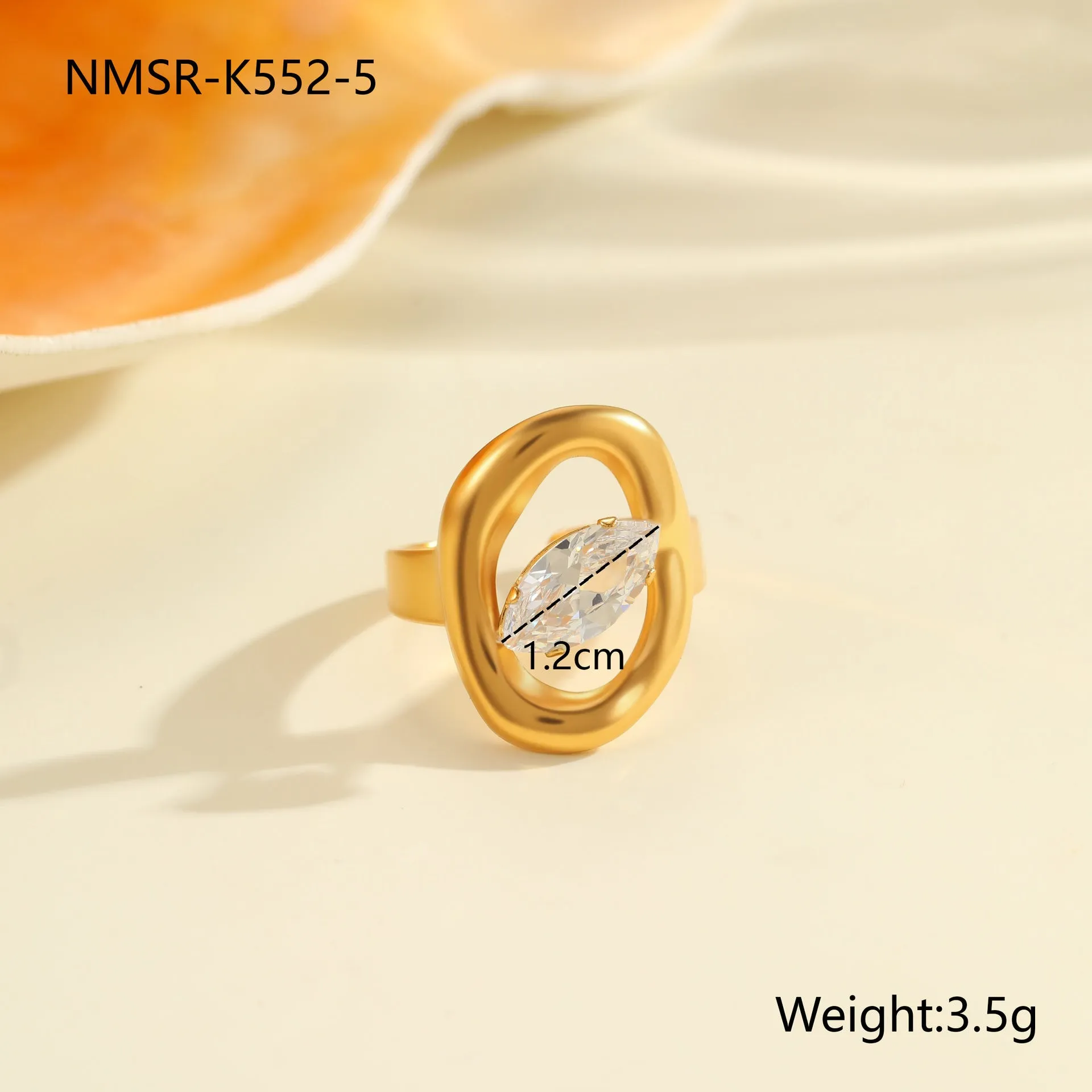 Geometric open mouth zircon ring in stainless steel with electroplated colour finish.