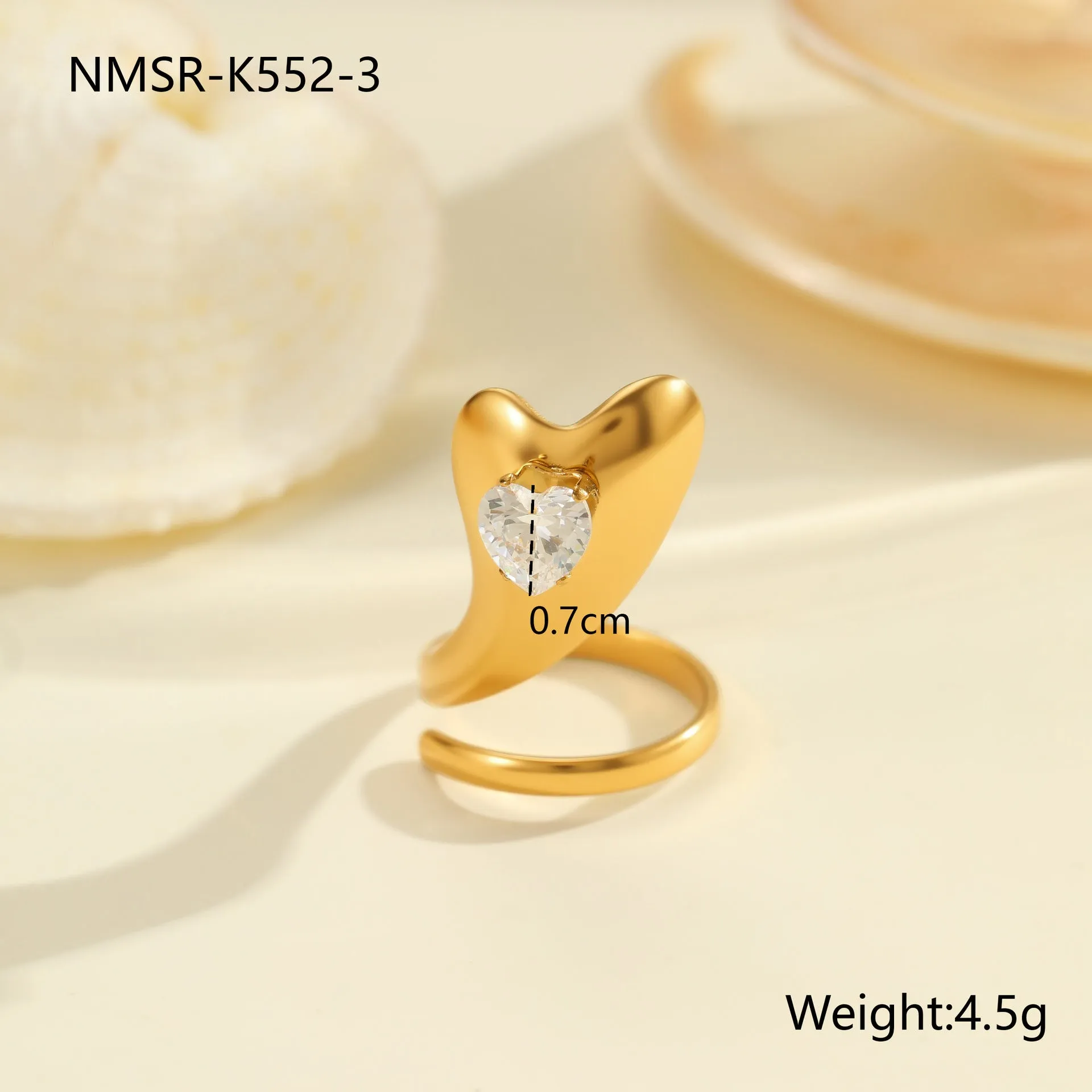 Geometric open mouth zircon ring in stainless steel with electroplated colour finish.