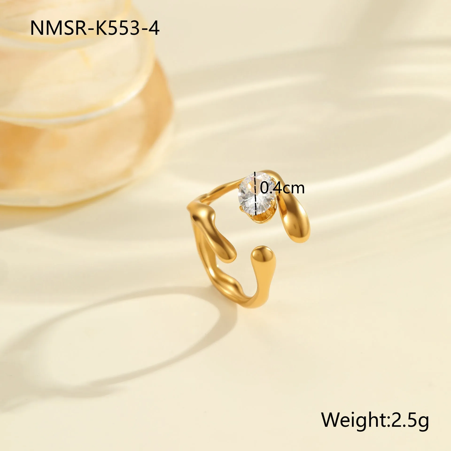 Geometric open mouth zircon ring in stainless steel with electroplated colour finish.