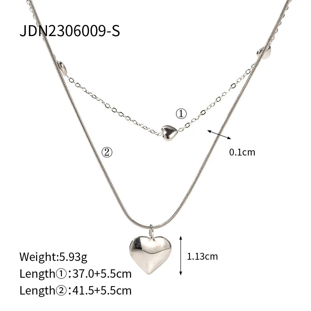 Love double-layer 18K gold-plated collarbone necklace with snake pendant for women on display