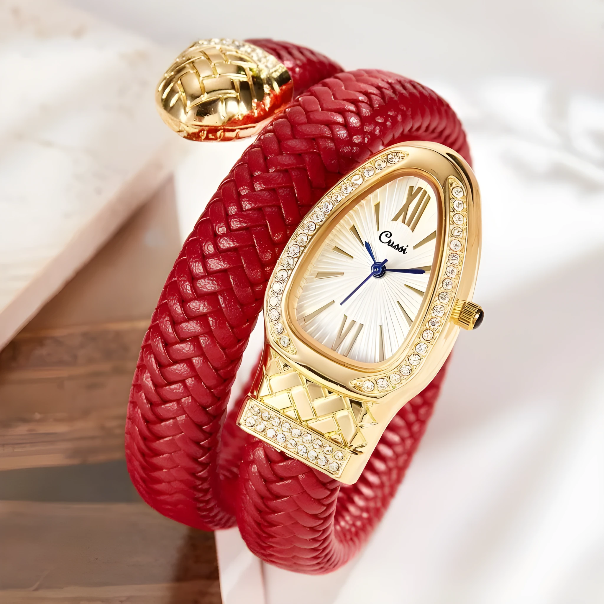 Snake fashion quartz watch for women with diamond accent and leather strap in black brown