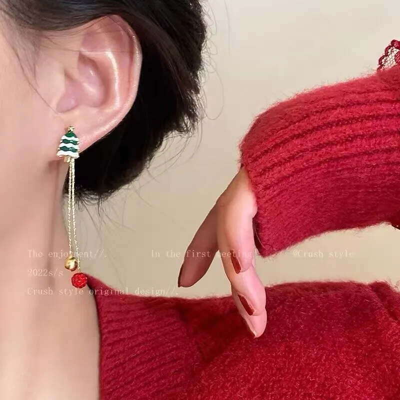 Moving Santa Claus long tassel asymmetric drop earrings for women alloy festive Christmas design