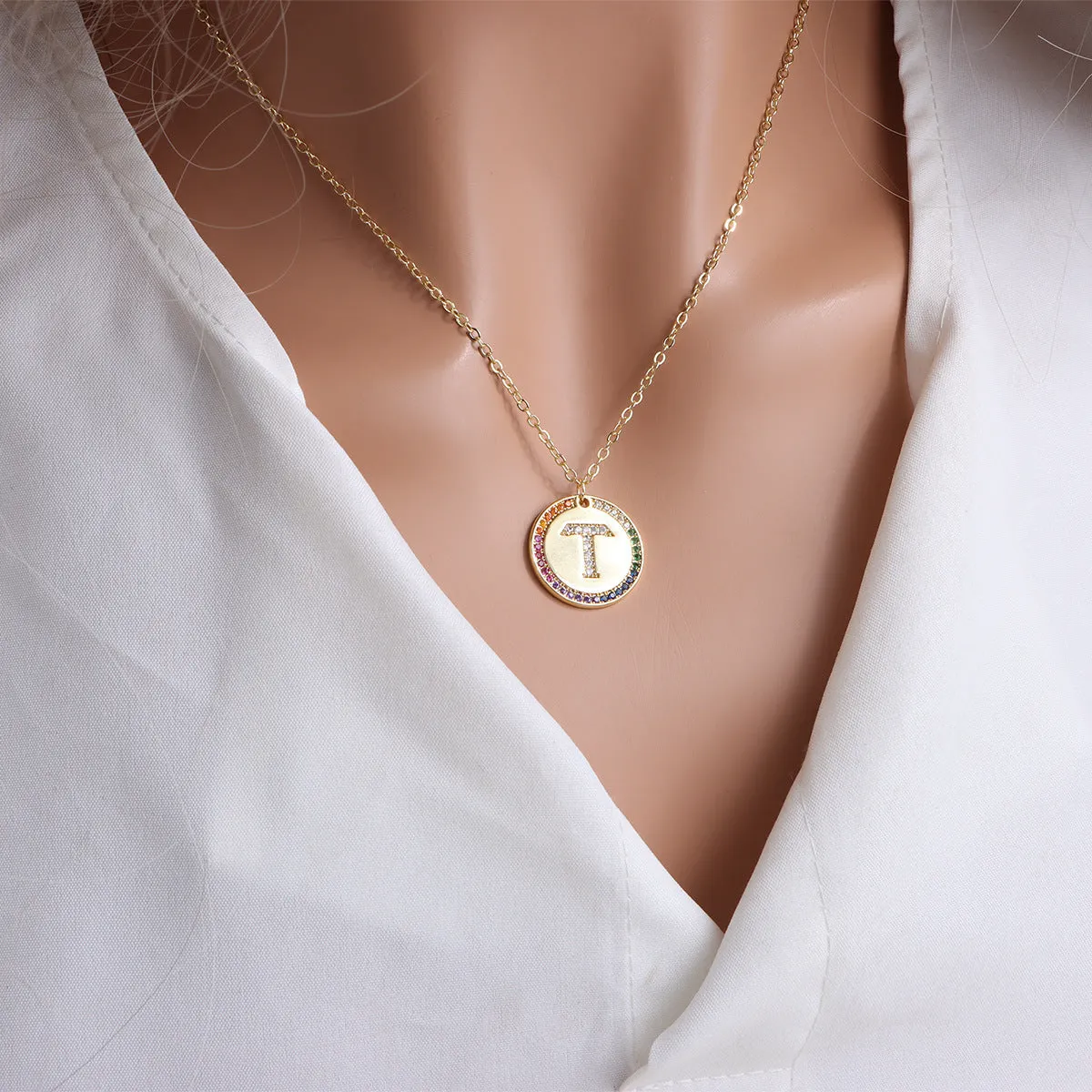 Gold English letter round pendant necklace with colourful crystals on clavicle length chain