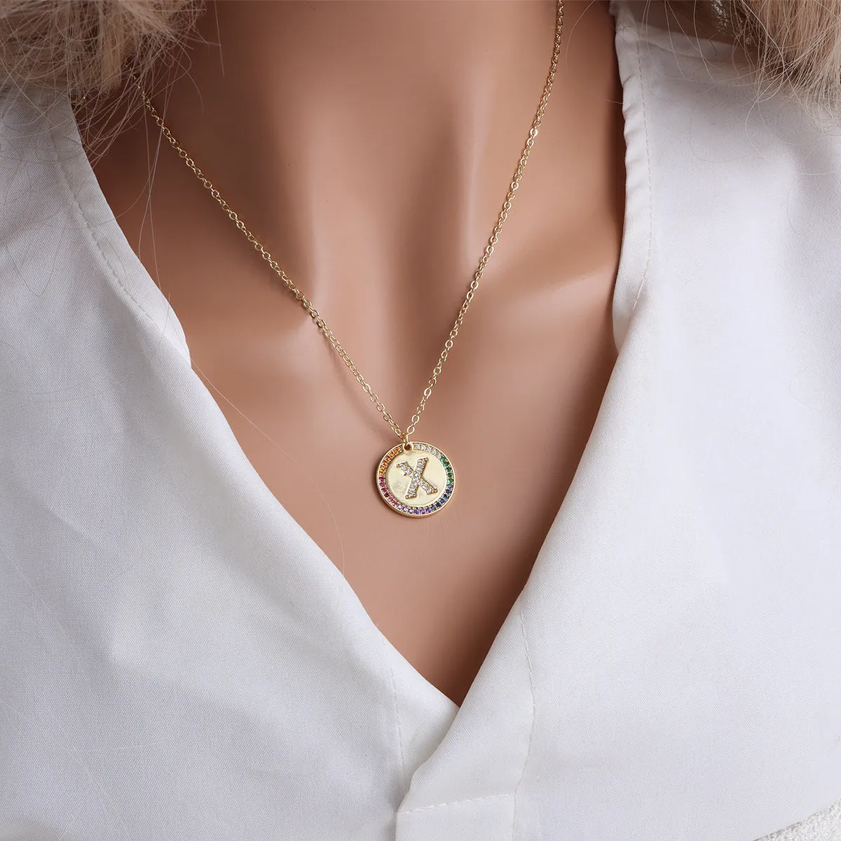 Gold English letter round pendant necklace with colourful crystals on clavicle length chain