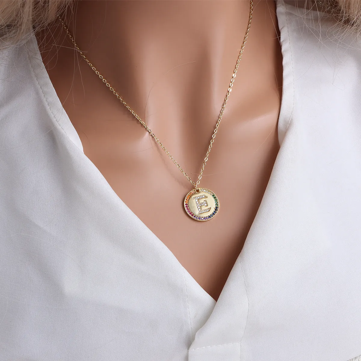 Gold English letter round pendant necklace with colourful crystals on clavicle length chain