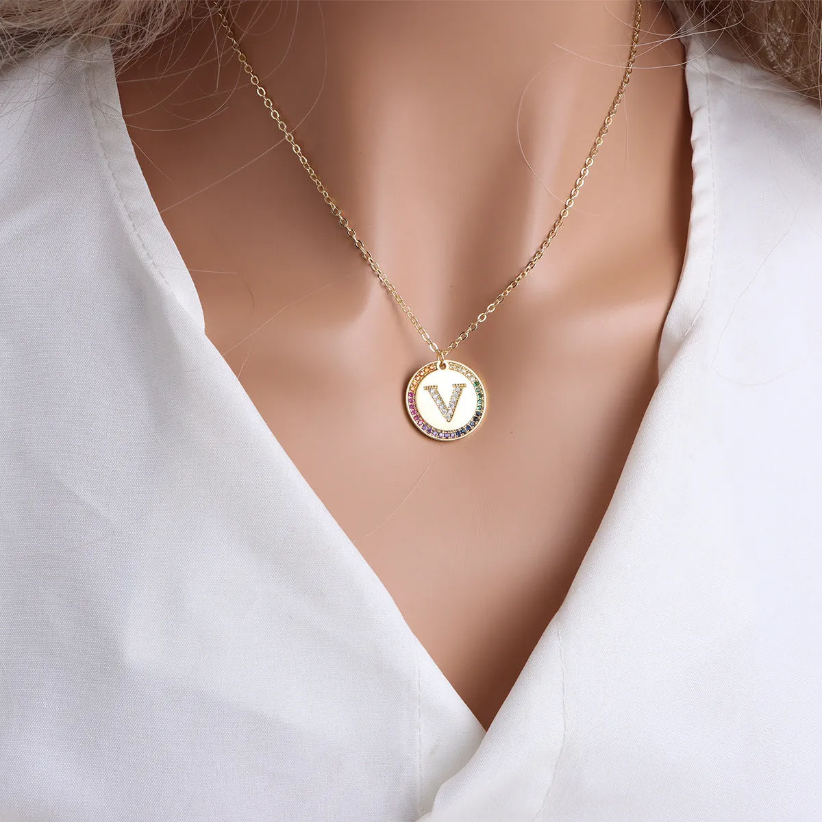 Gold English letter round pendant necklace with colourful crystals on clavicle length chain