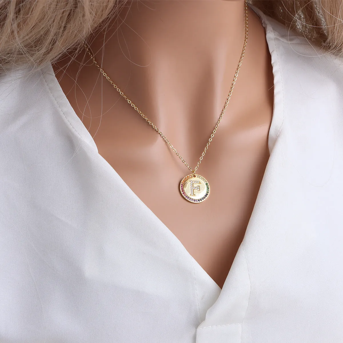 Gold English letter round pendant necklace with colourful crystals on clavicle length chain