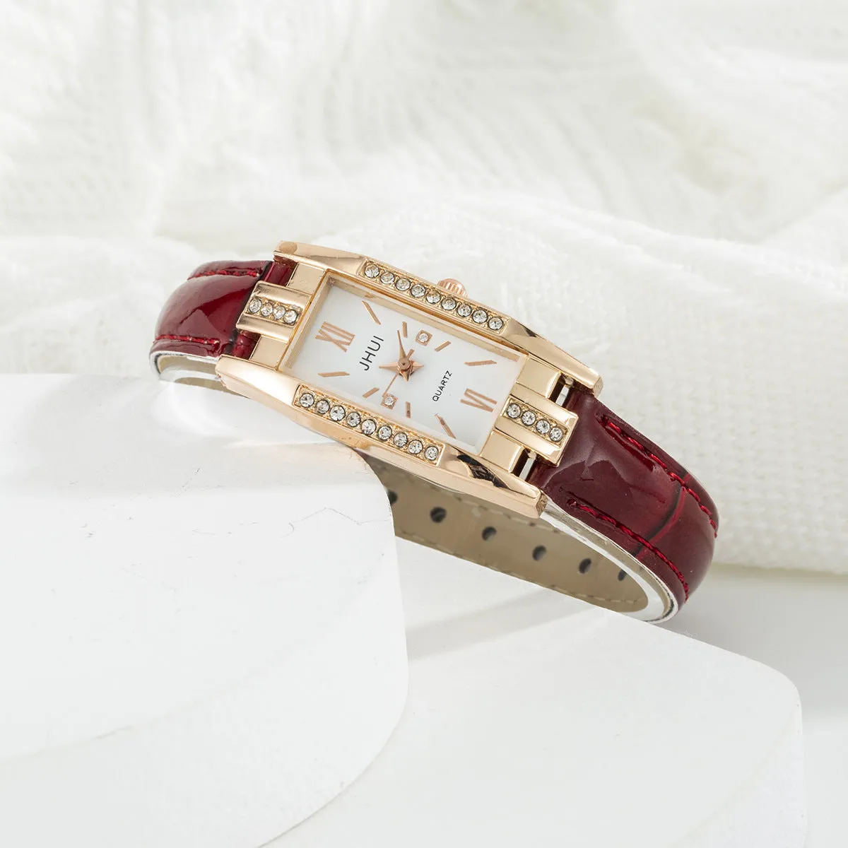 Women's rectangular quartz watch with small diamond on red PU strap, alloy case