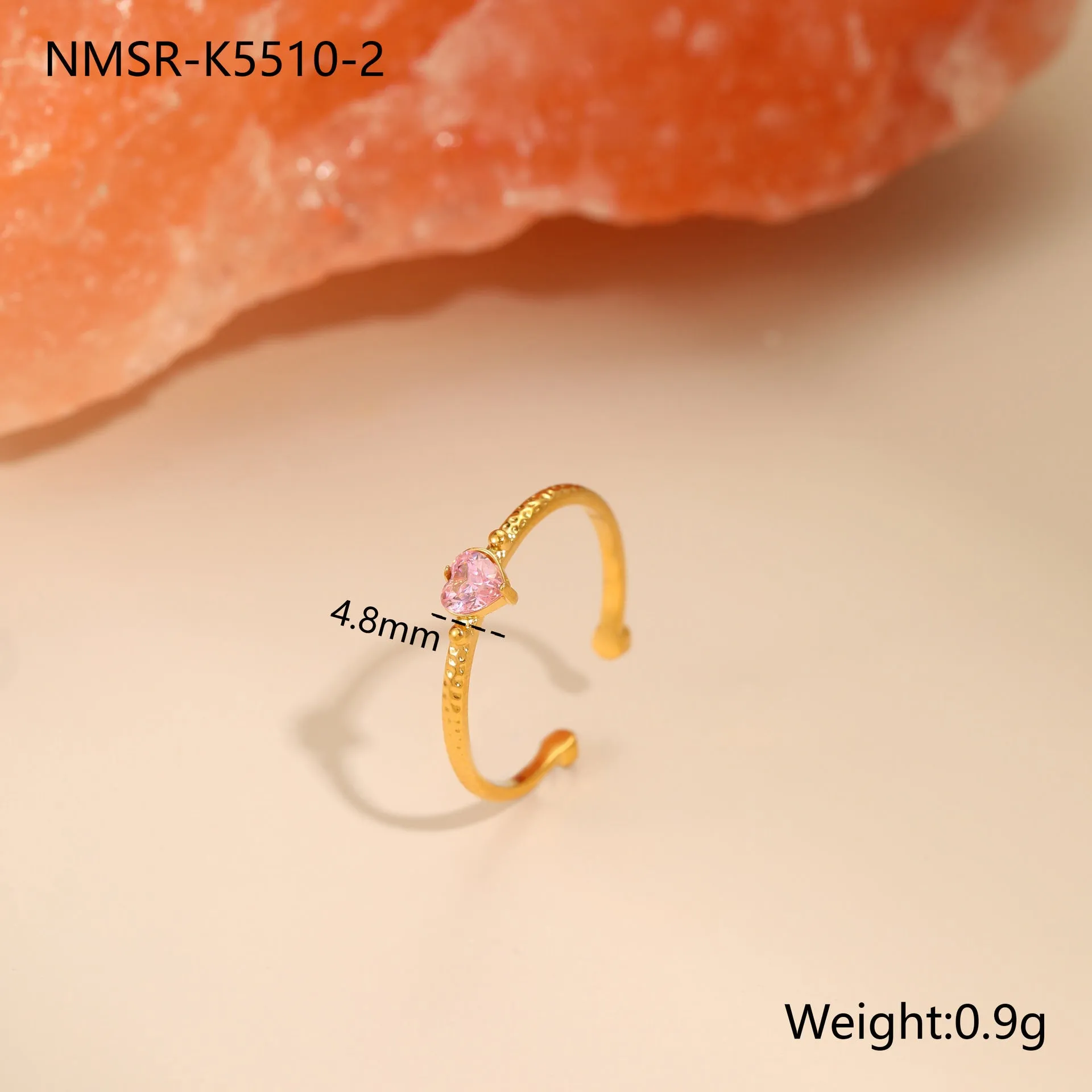 Heart-shaped open-ended ring with geometric design and inlaid zircon detail in stainless steel