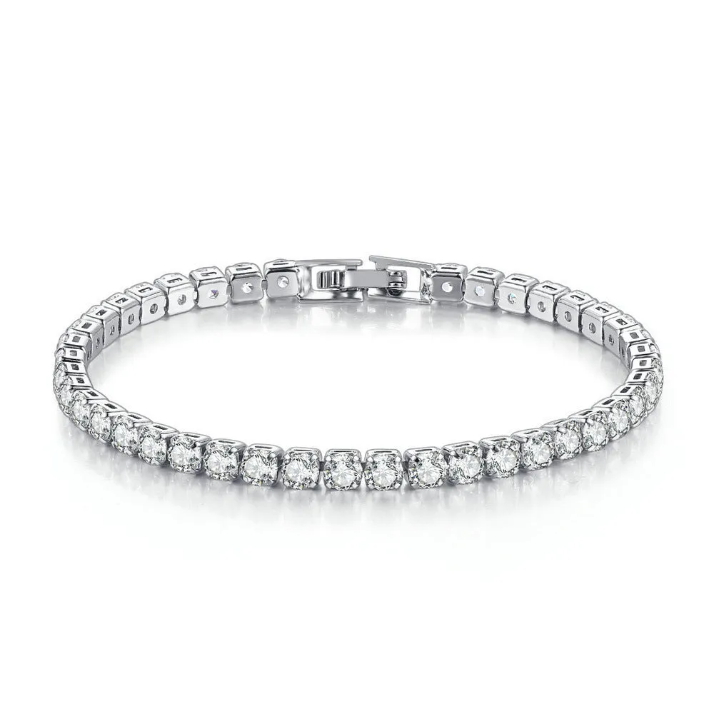 Stainless steel zircon bracelet single row 4mm round full diamond tennis chain in gold finish on white background