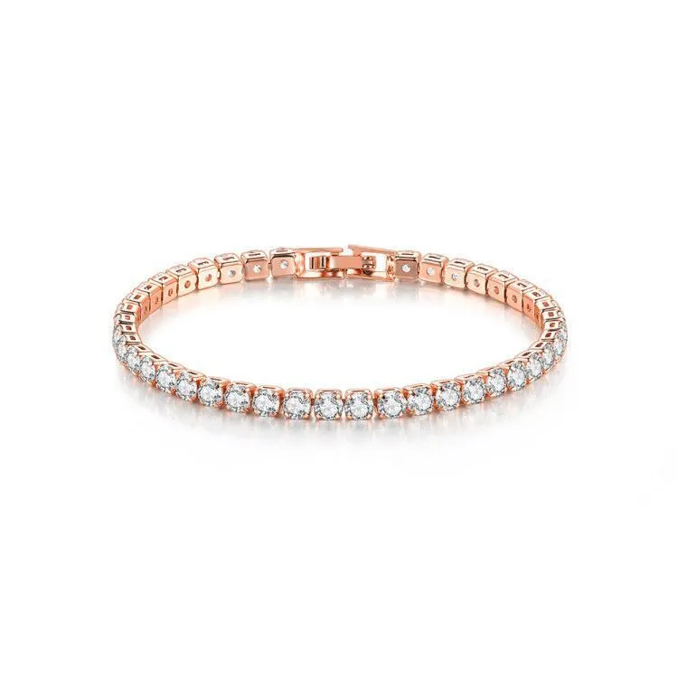 Stainless steel zircon bracelet single row 4mm round full diamond tennis chain in gold finish on white background