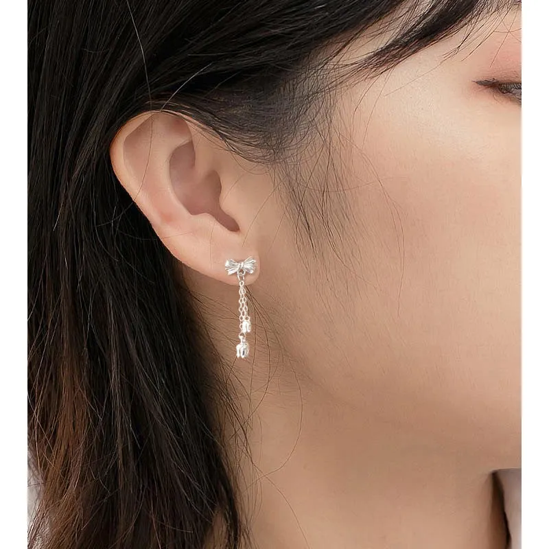 Silver bow eardrops with sweet tassel bone stud design for women
