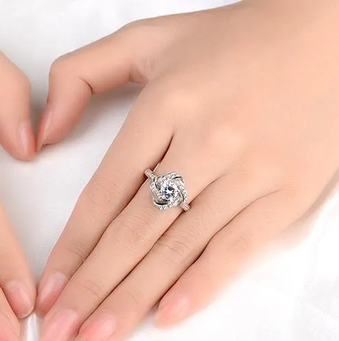 925 sterling silver open band ring with cubic zirconia stone on white background