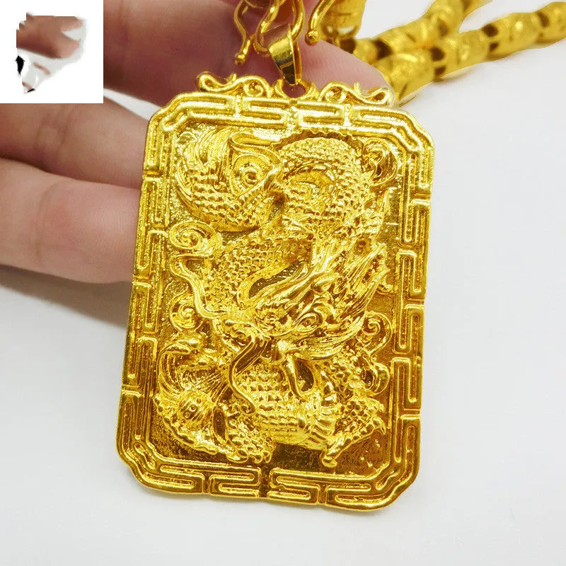Gold dragon pendant for men, solid 40g metal, animal zodiac style, on display