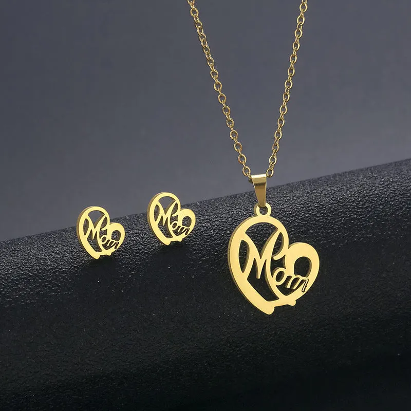 Stainless steel heart-shaped mom necklace and earring set in TZ-216 gold finish on display