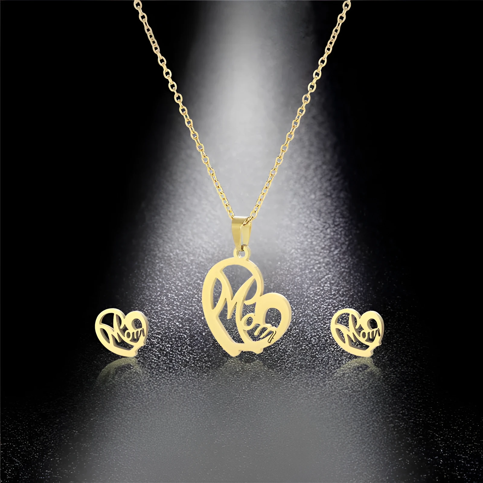 Stainless steel heart-shaped mom necklace and earring set in TZ-216 gold finish on display