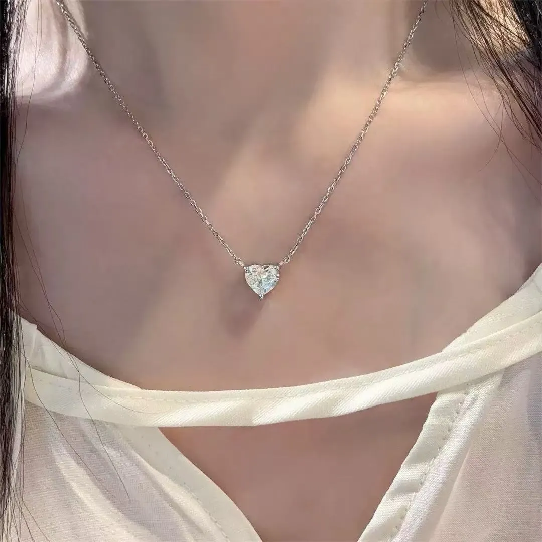 Women's silver-toned copper necklace with simple heart pendant on fine chain