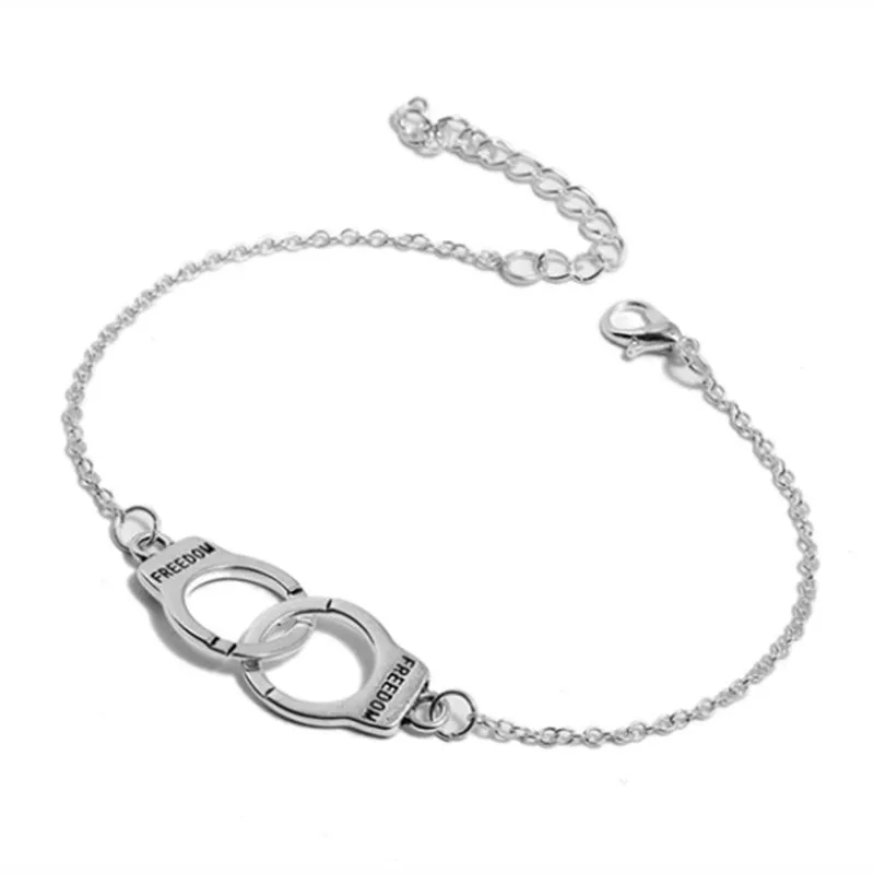 Silver geometric alloy anklet on ankle, 18cm length, simple electroplated finish