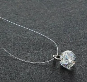 Transparent fishline necklace with simple clavicle chain and geometric copper pendant in Korean style