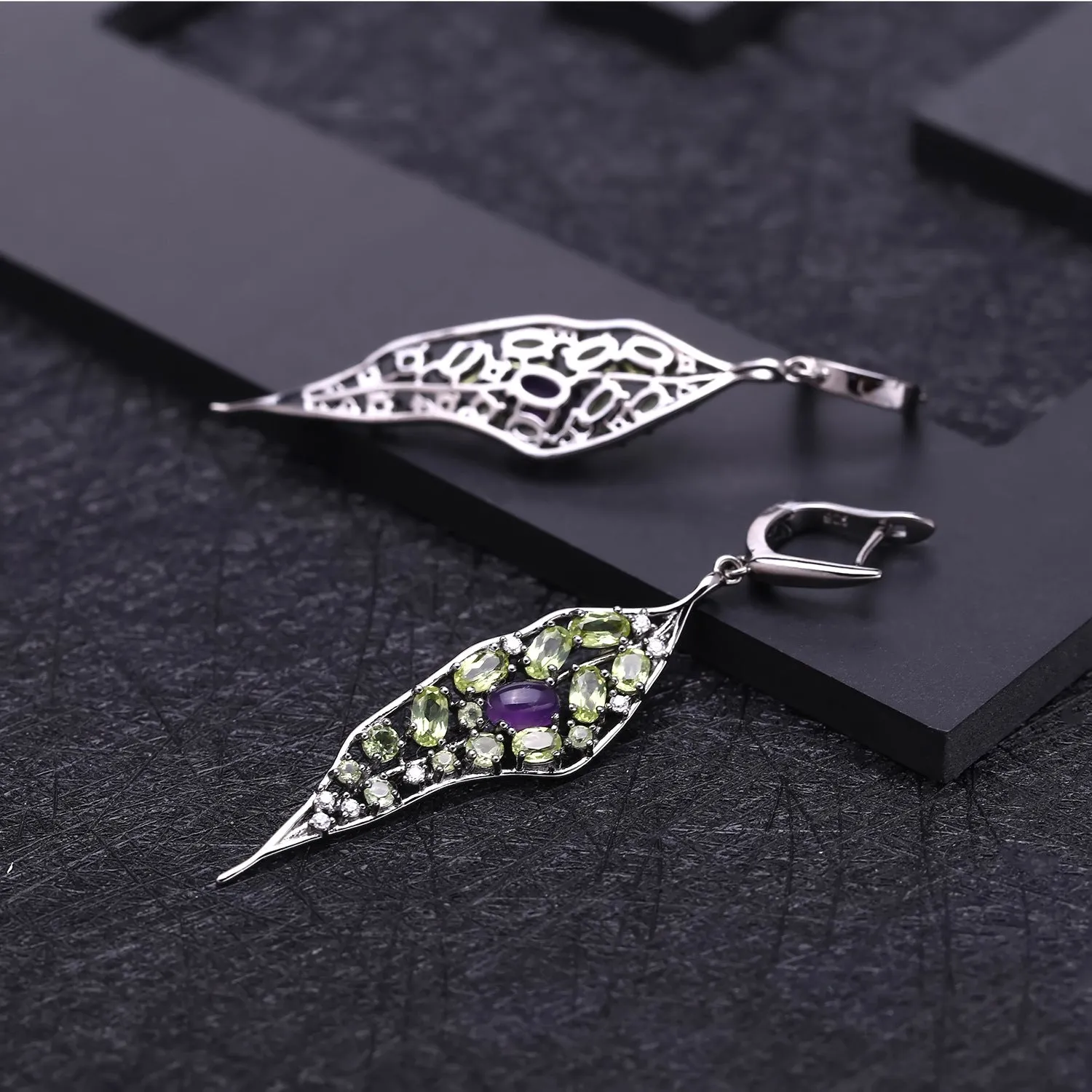 Women's 925 sterling silver earrings with purple amethyst and green olivine gems in a retro style