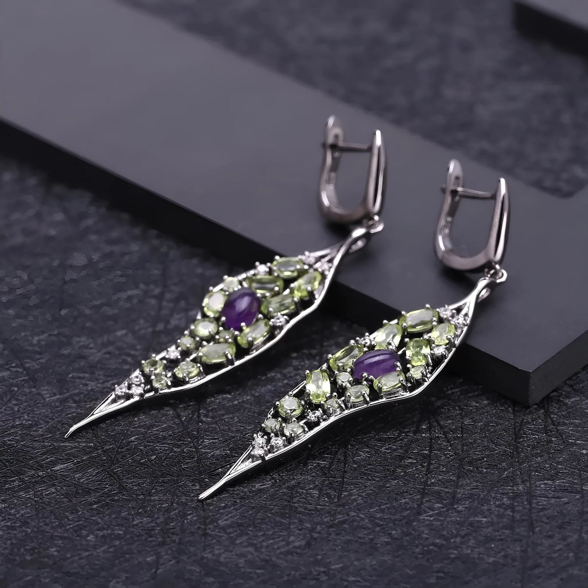 Women's 925 sterling silver earrings with purple amethyst and green olivine gems in a retro style