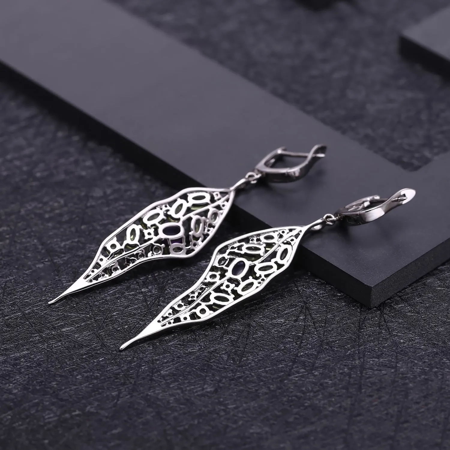 Women's 925 sterling silver earrings with purple amethyst and green olivine gems in a retro style