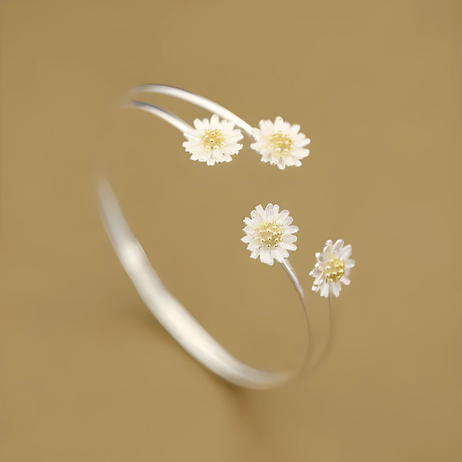 S925 sterling silver double daisy bracelet on a plain background, showing two daisy-shaped elements in a layered design
