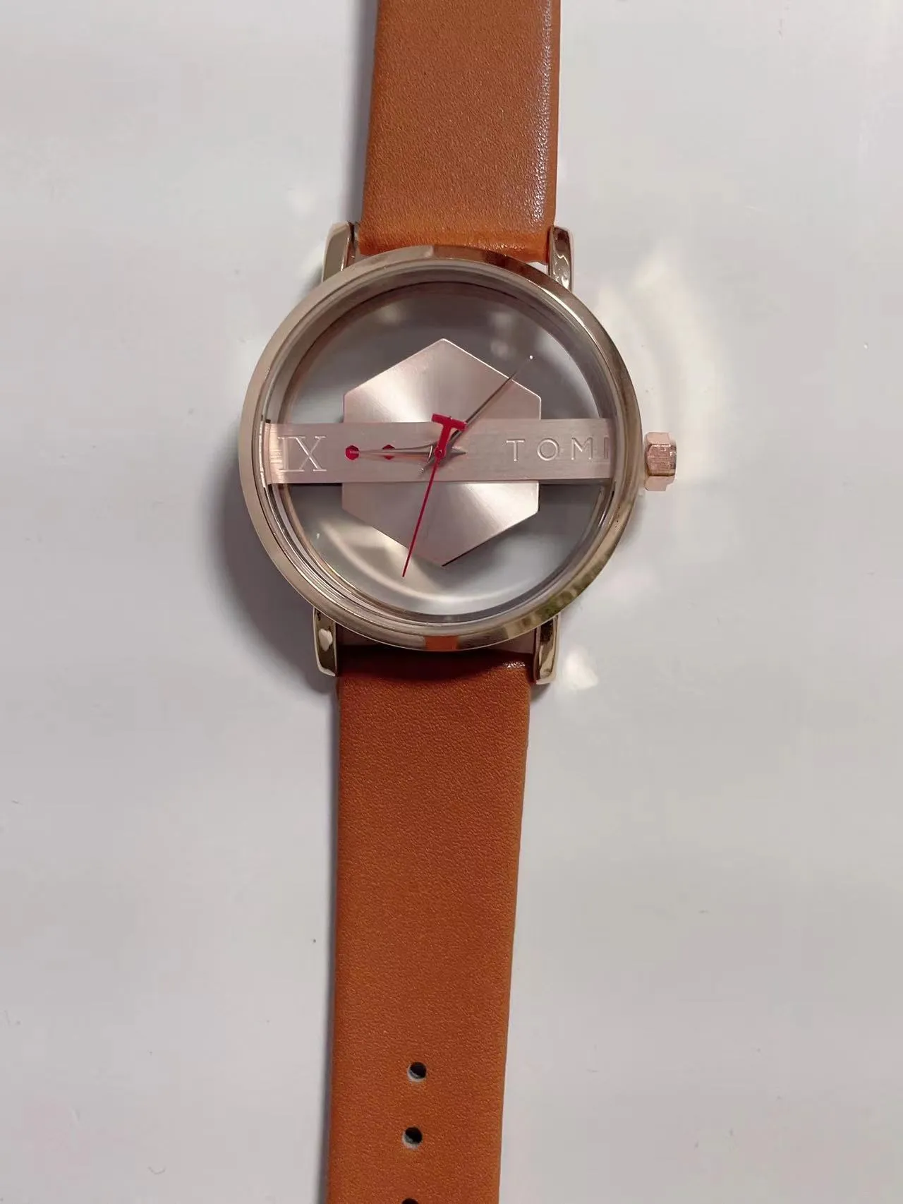 Hollow out see-through unisex leather casual quartz watch with brown gold surface and slim 10mm case