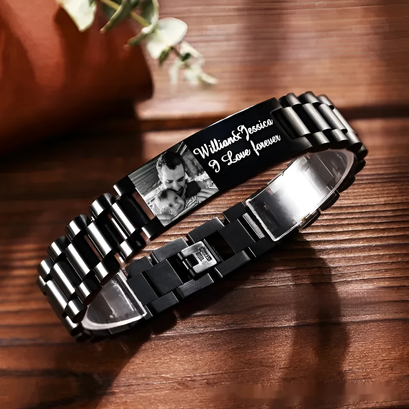 Titanium steel bracelet with curved heart piece featuring electroplated lettering in gift box