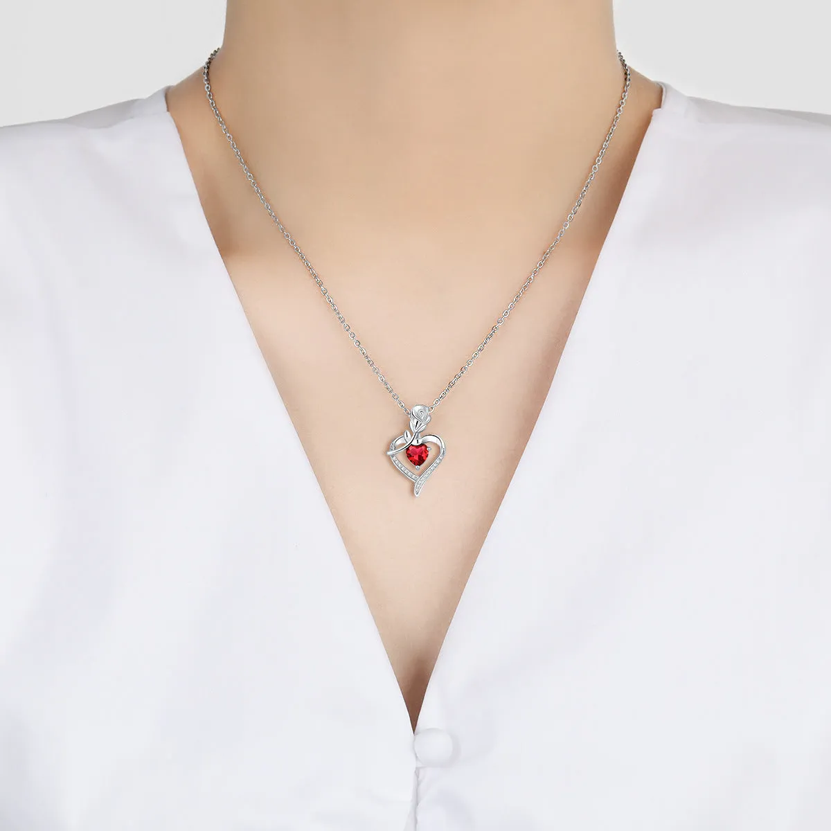Rose heart-shaped necklace with rhinestones in copper electroplated finish, available in blue, purple, red, or white
