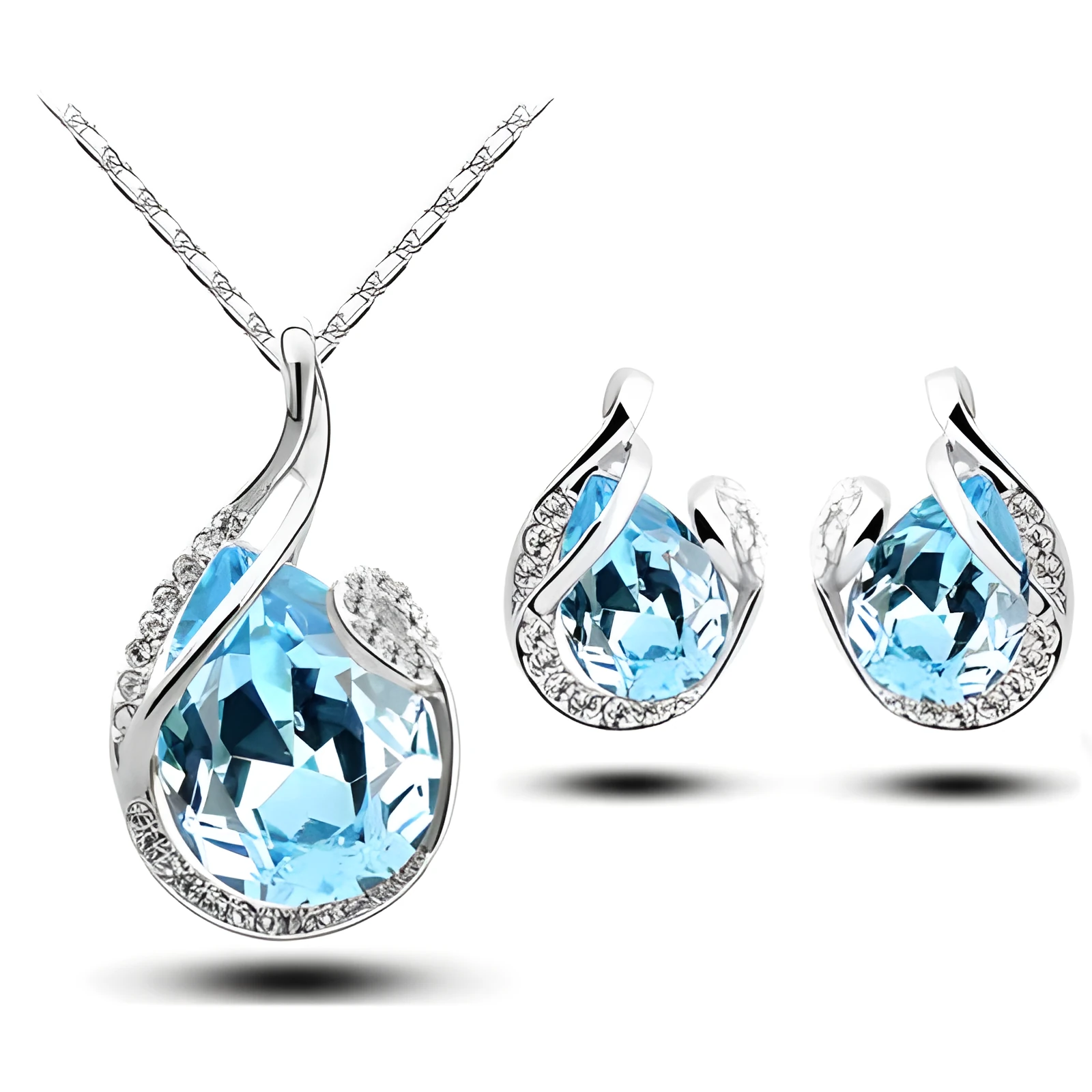 Rhinestone earring and necklace set in white with alloy inlaid gemstones on a display background