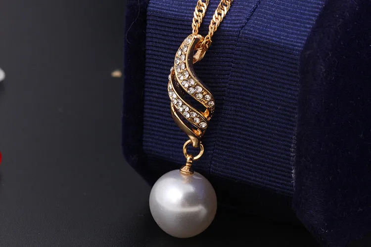 Pearl stud necklace set with mother-of-pearl pendant on water wave chain in gold finish
