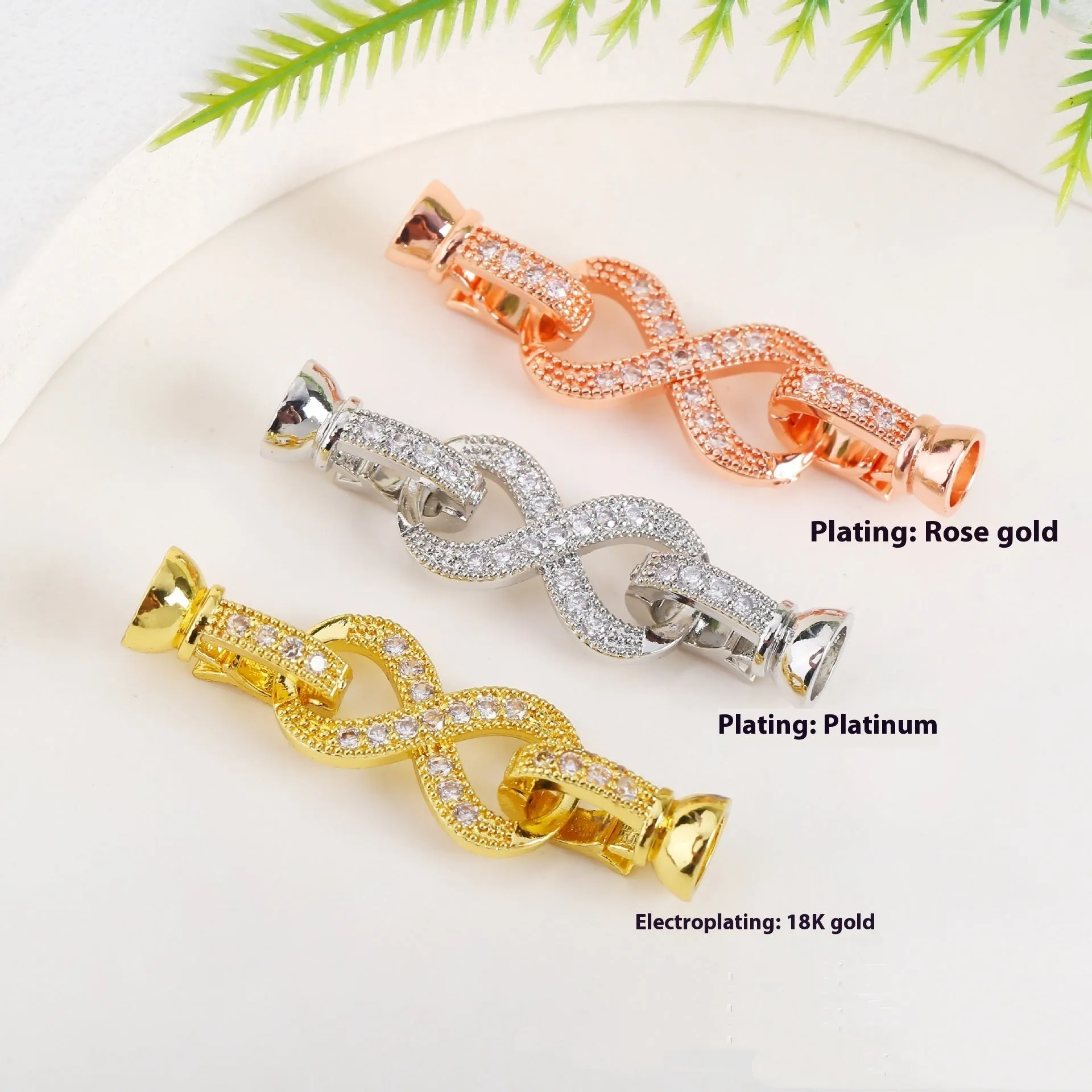 Small gold-plated brass jewellery clasp with white pearl detail for DIY necklace projects