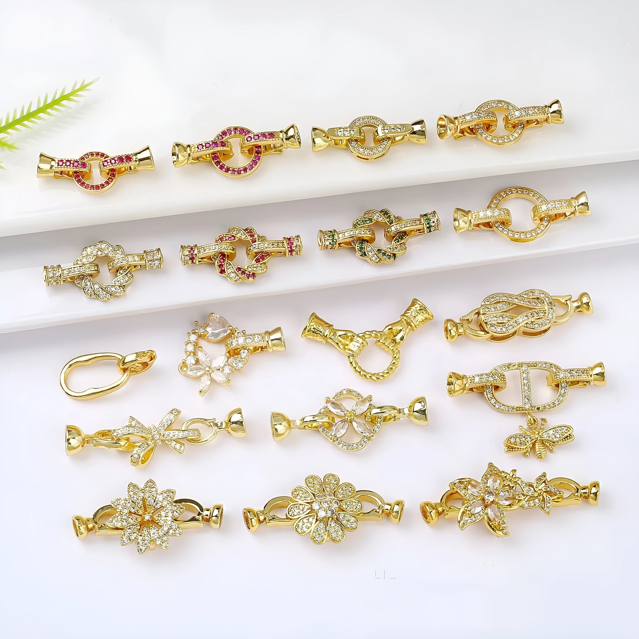 Small gold-plated brass jewellery clasp with white pearl detail for DIY necklace projects