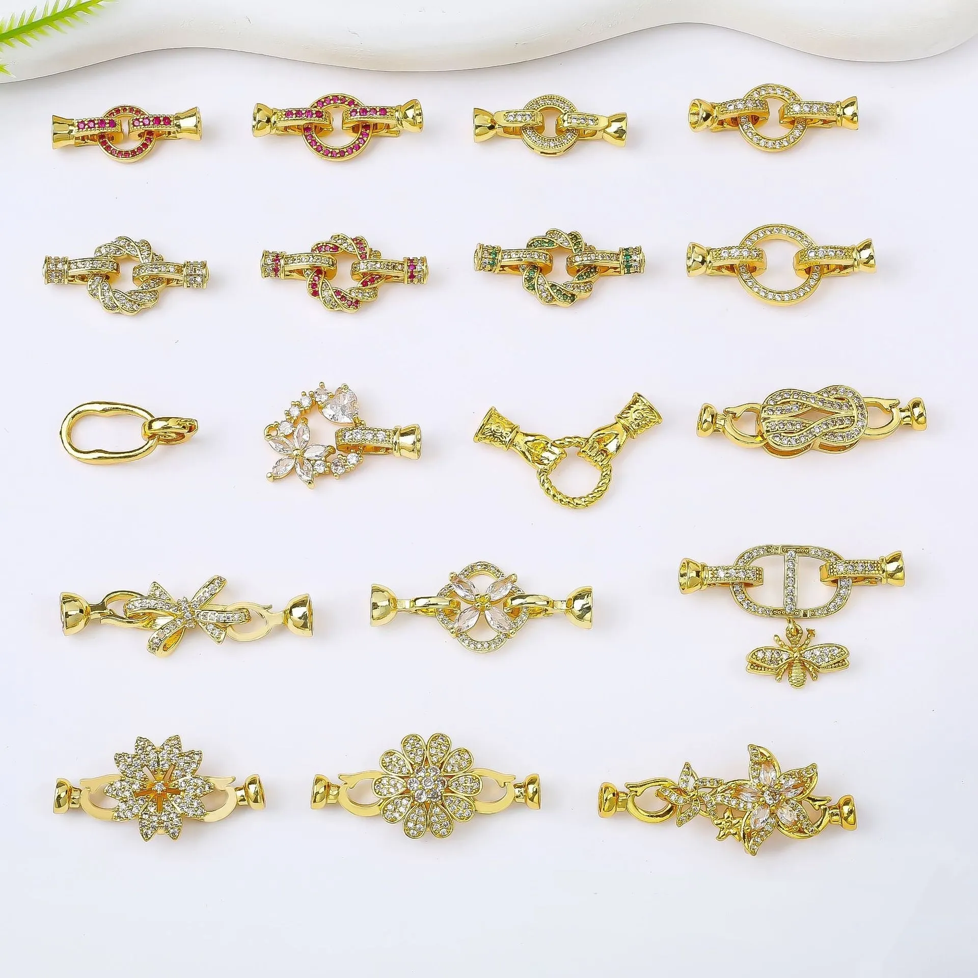 Small gold-plated brass jewellery clasp with white pearl detail for DIY necklace projects