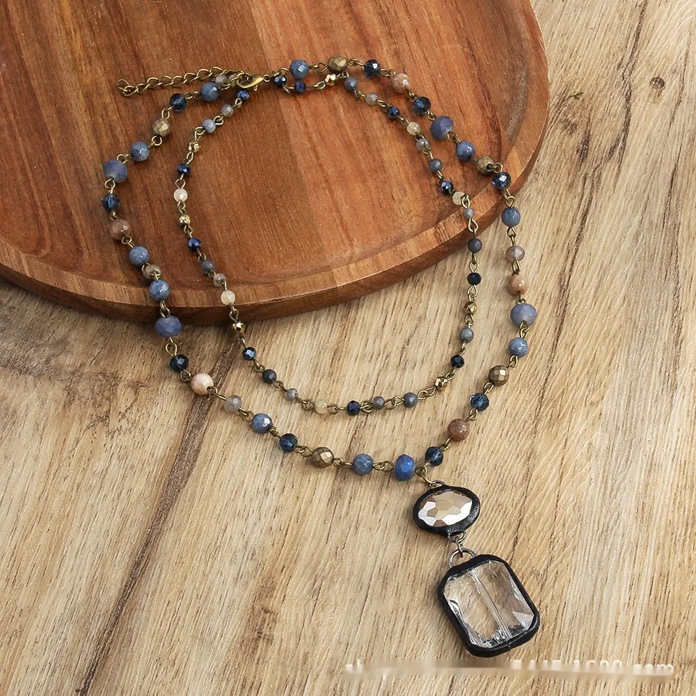 Tribal style necklace with glass stone pendant on two-layer adjustable chain