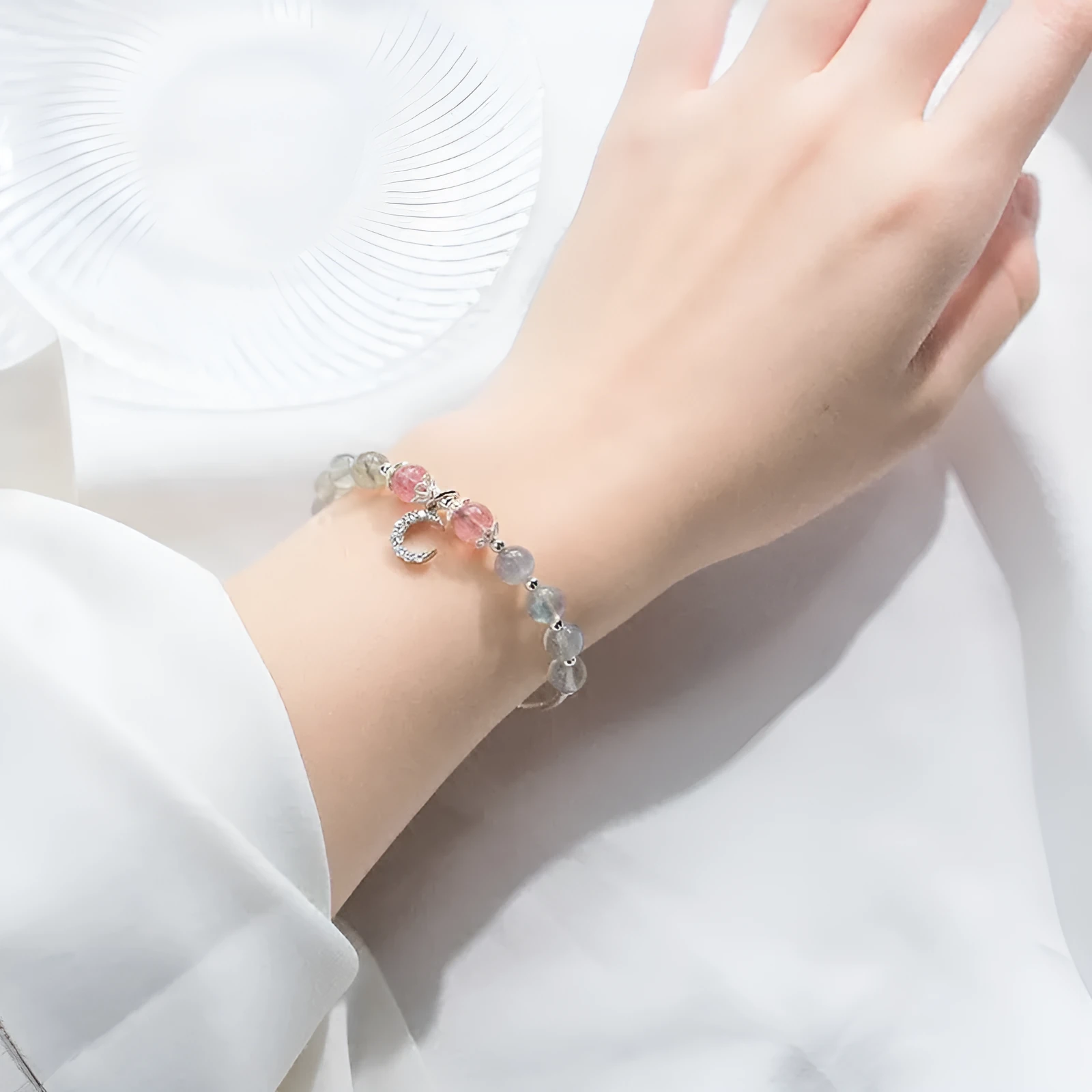 Handmade moonstone bracelet with crescent charm on adjustable extension chain