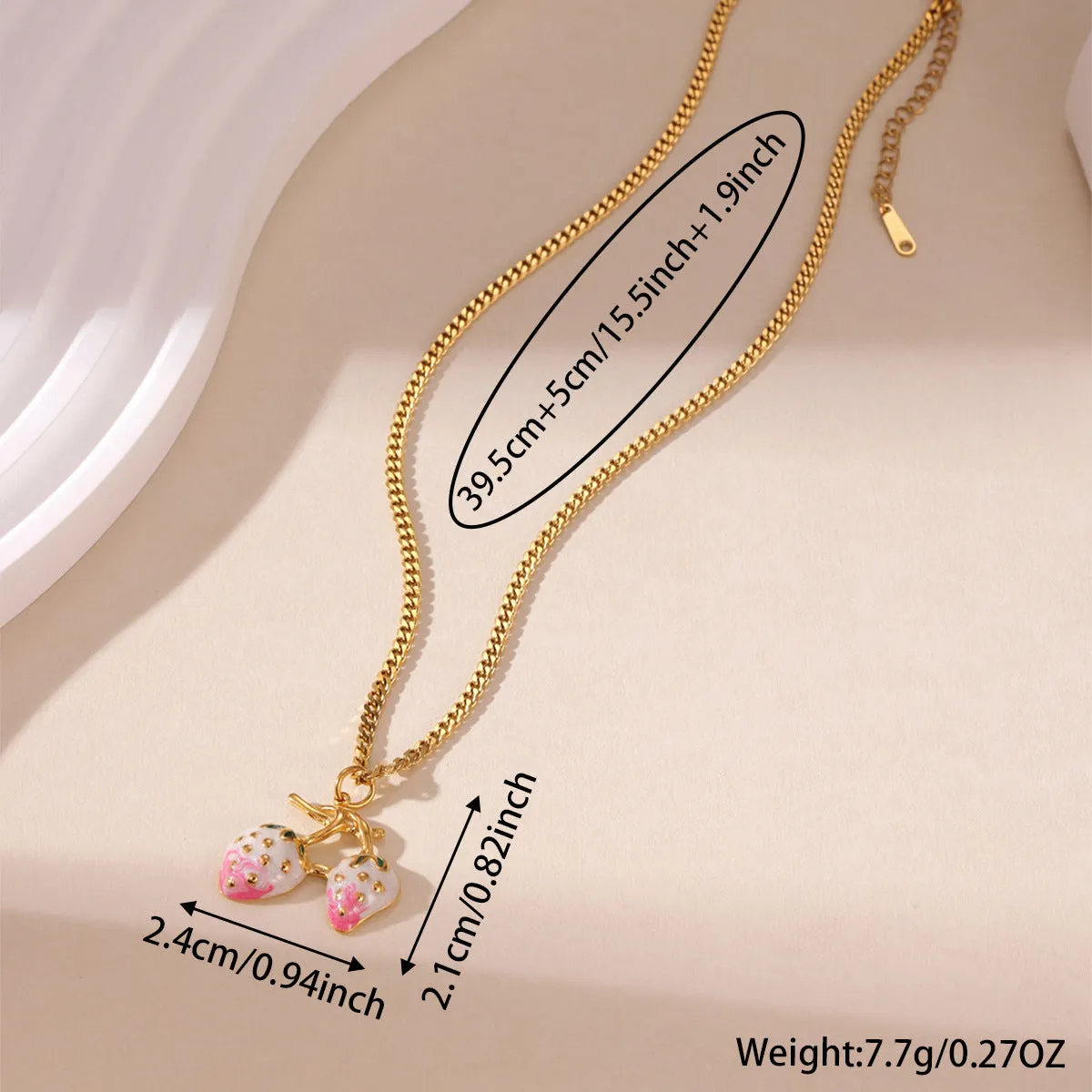 Stainless steel strawberry pendant necklace on an alloy chain, shown in red and white gradient colour options.