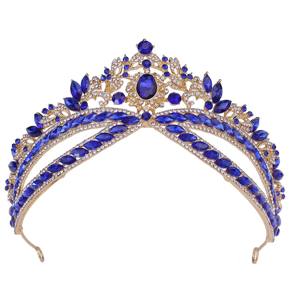 Wedding crown headdress with rhinestone and crystal in silver white finish on display
