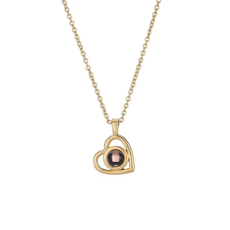 925 silver heart shaped pendant with custom photo projection feature on white background