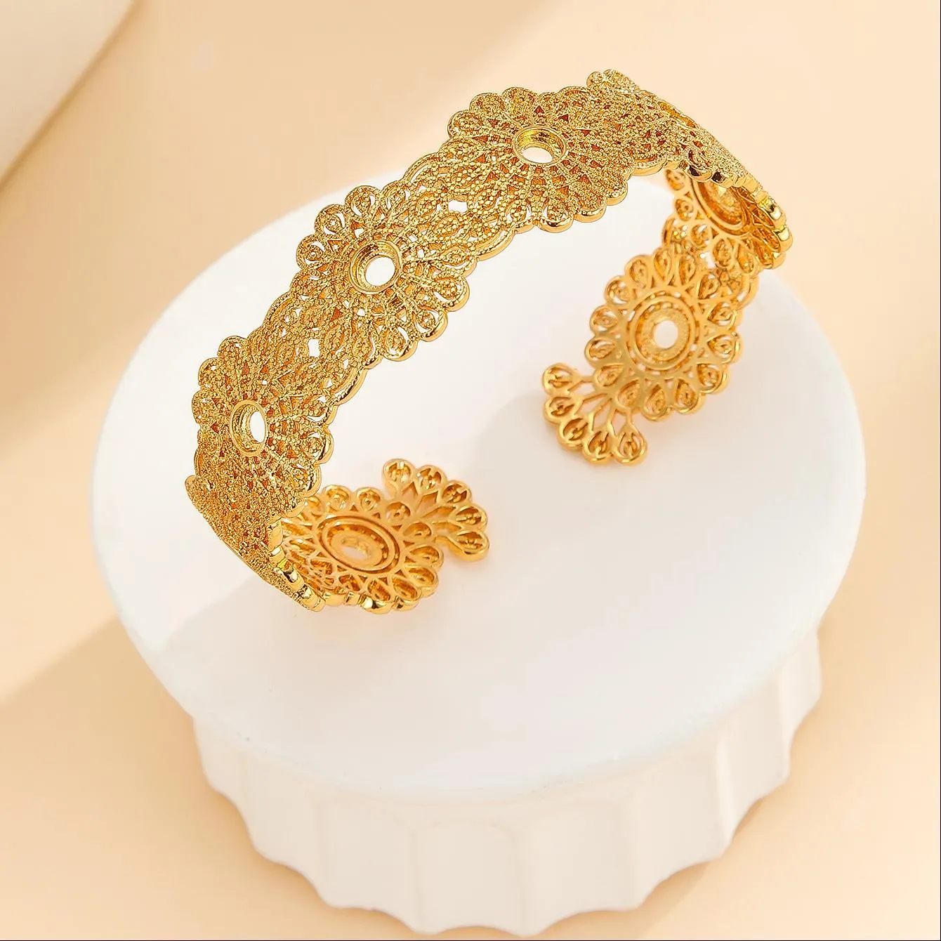 Gold bracelet with hollowed out lace flower design, gold finish, gold plated copper