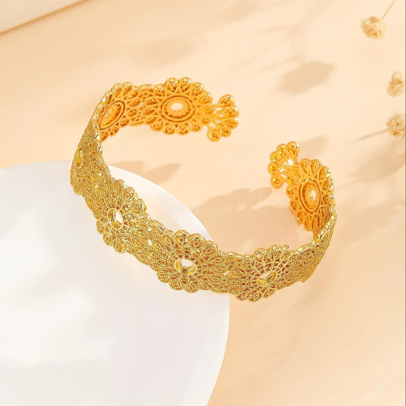 Gold bracelet with hollowed out lace flower design, gold finish, gold plated copper
