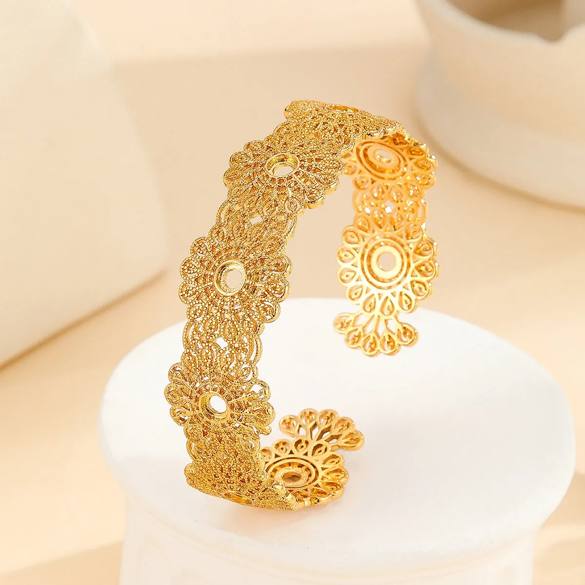 Gold bracelet with hollowed out lace flower design, gold finish, gold plated copper