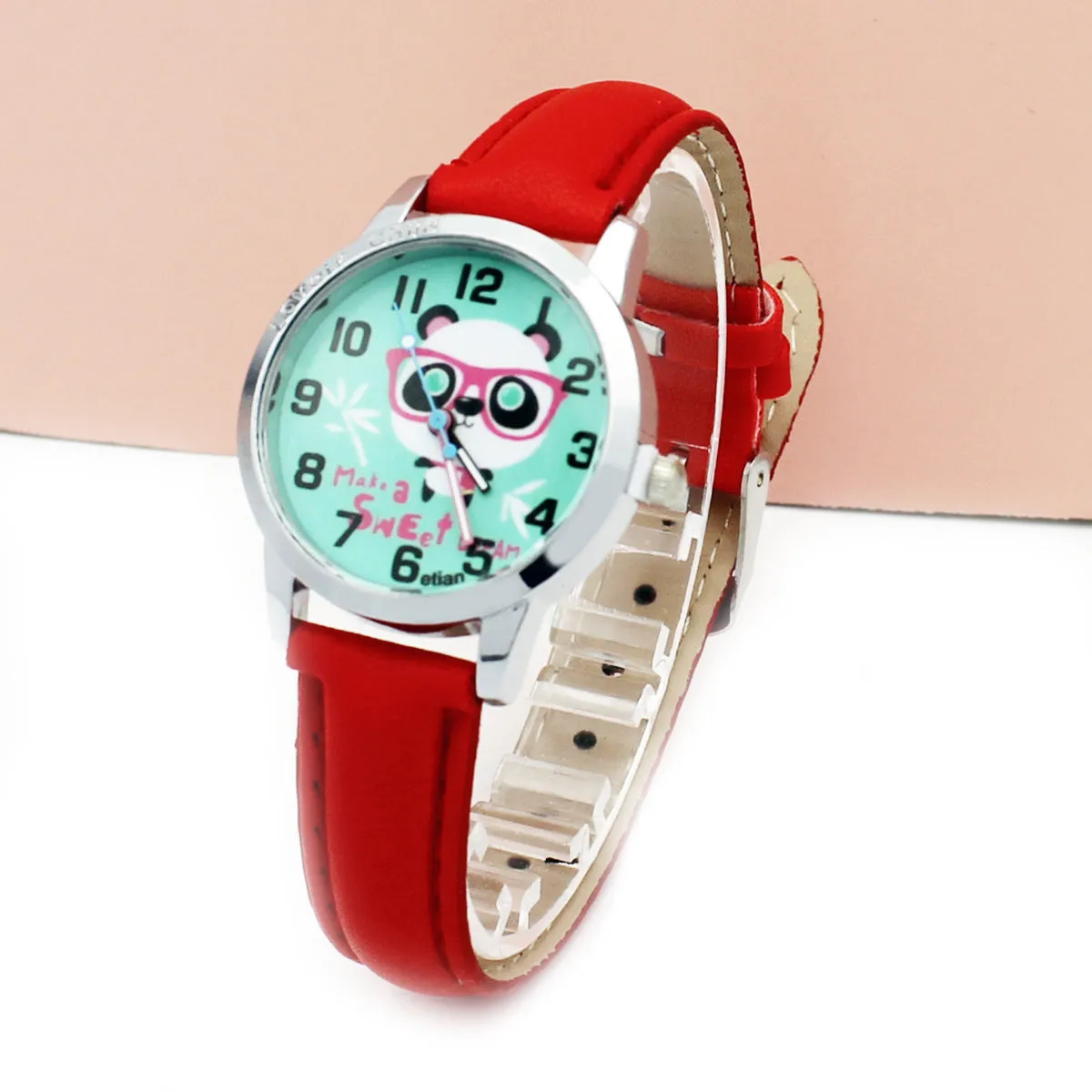 Children's cartoon quartz wrist watch with slim 10mm case and colourful belt