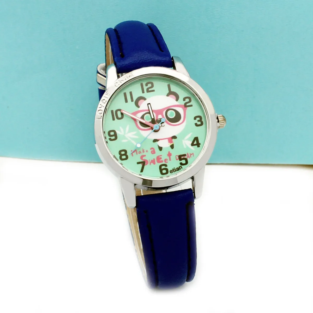 Children's cartoon quartz wrist watch with slim 10mm case and colourful belt
