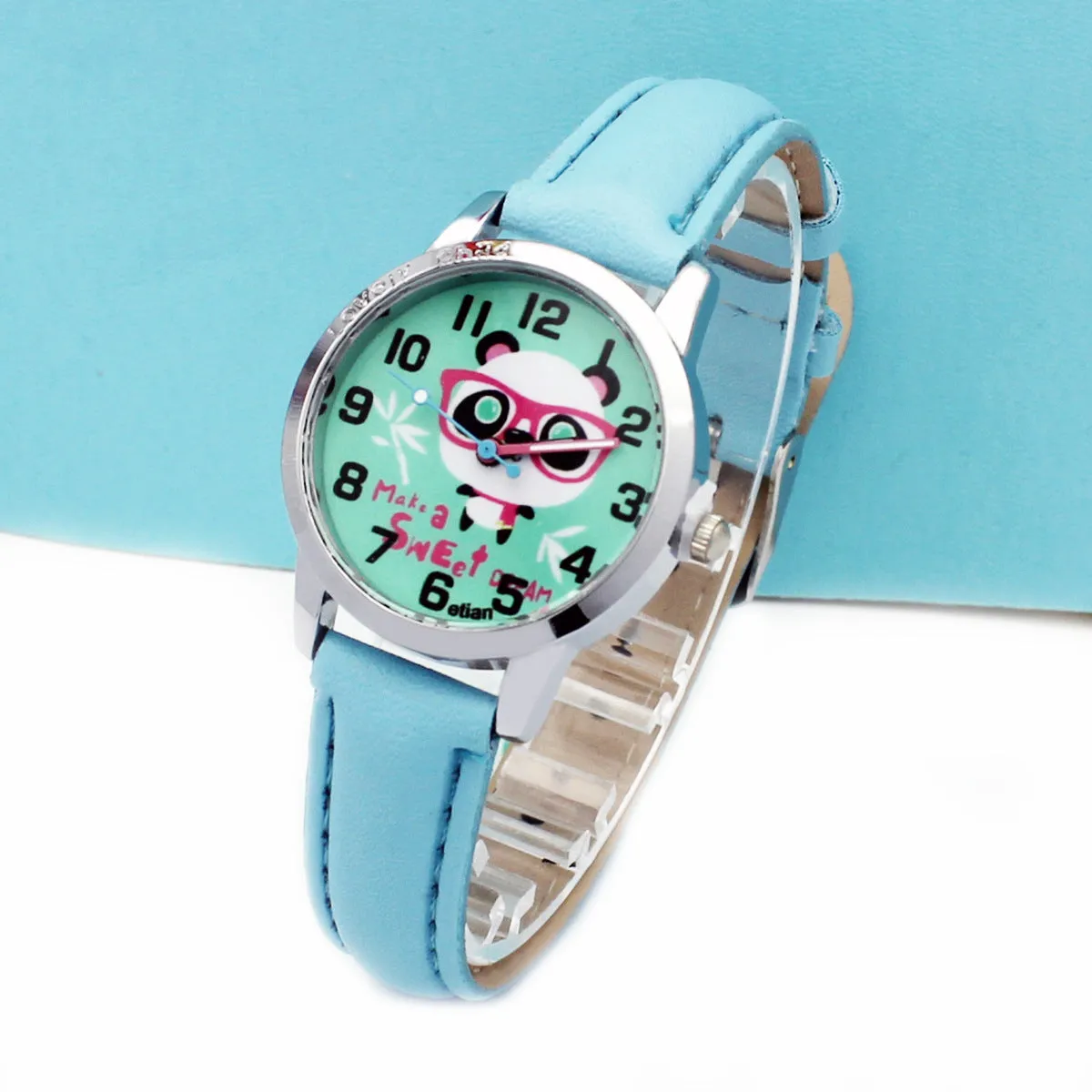 Children's cartoon quartz wrist watch with slim 10mm case and colourful belt