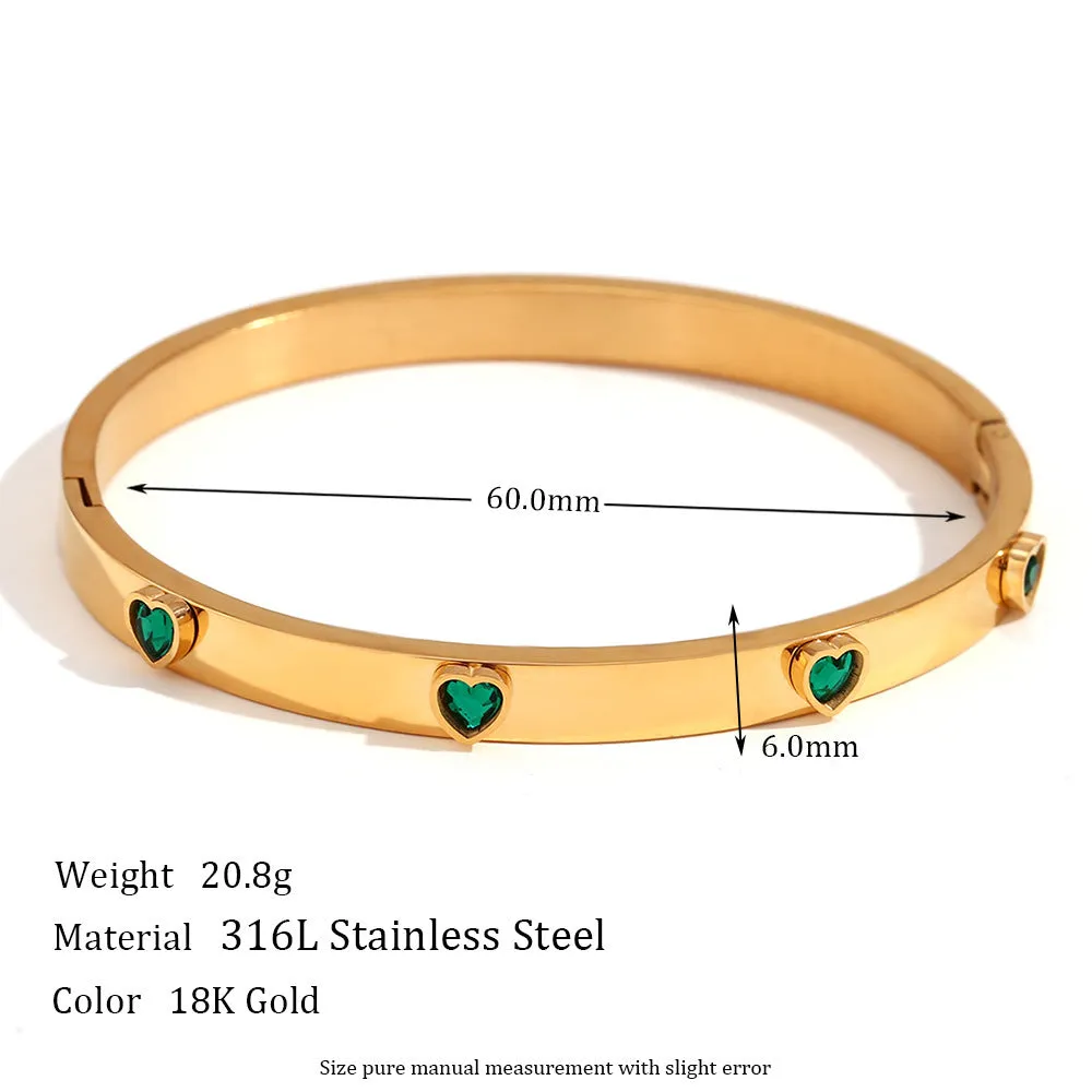 Gold electroplated stainless steel bracelet with micro-inlaid peach heart design and diamond accents