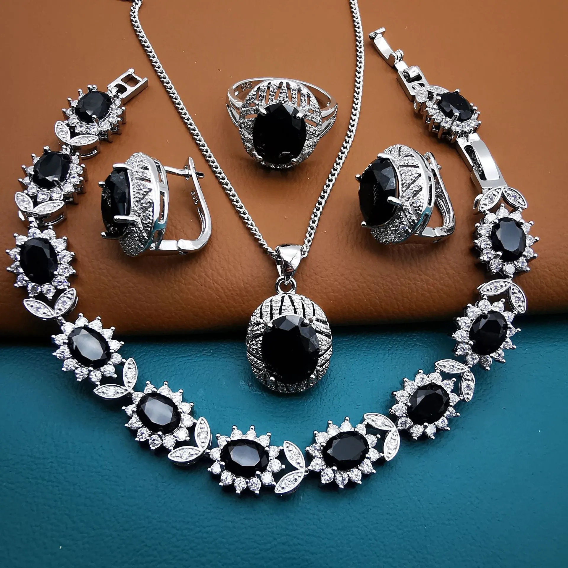 Four-piece mixed gem inlaid jewellery suit with zircon mosaic and O-ring chain in black, red, blue, green