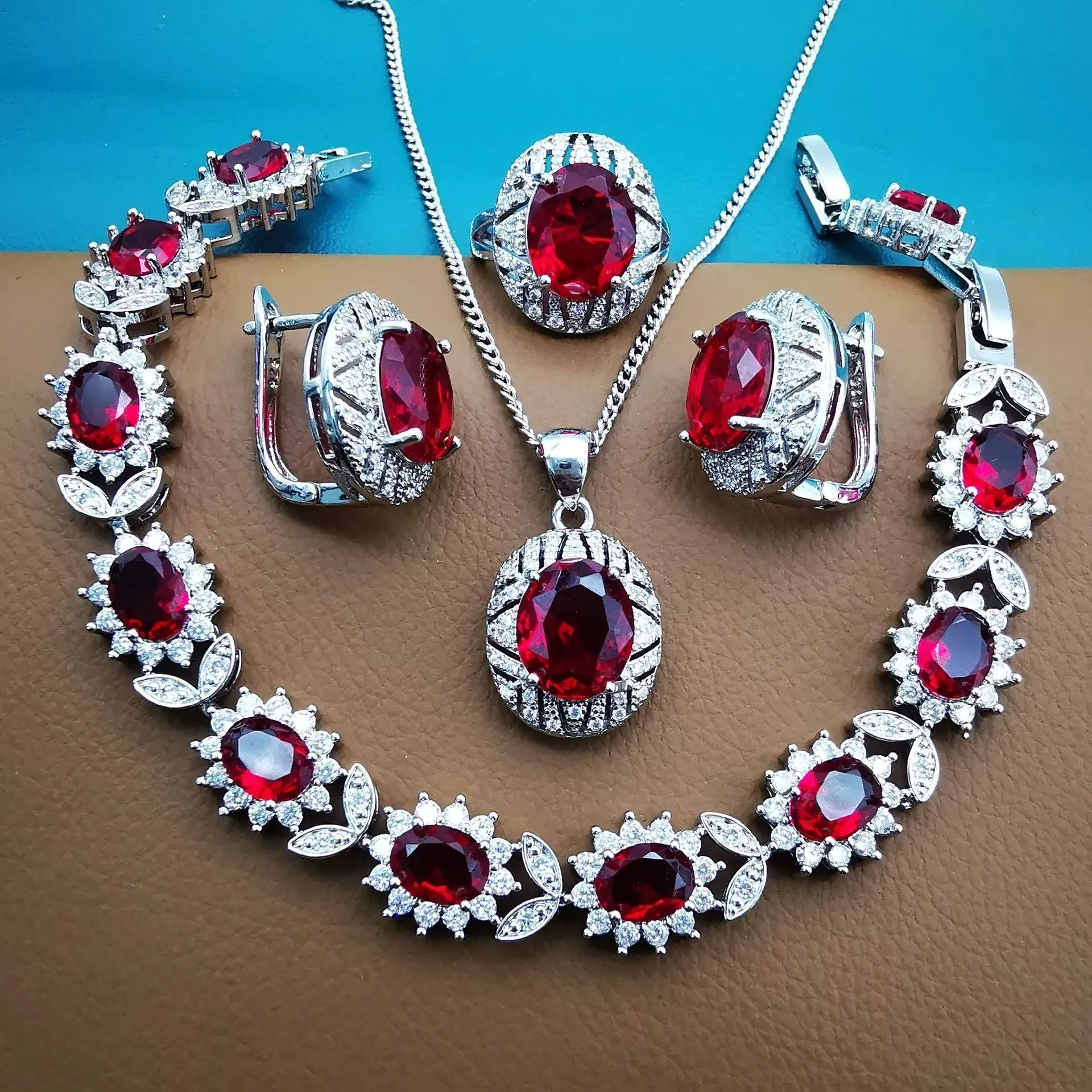 Four-piece mixed gem inlaid jewellery suit with zircon mosaic and O-ring chain in black, red, blue, green